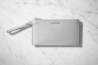 Šedá kožená psací taška Michael Kors