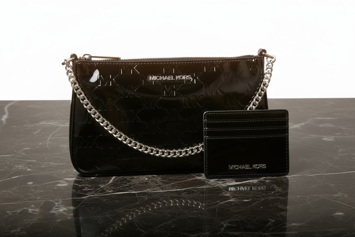 Michael Kors svart kuvertväska i canvas