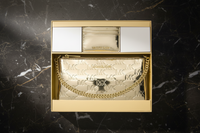 Michael Kors guldfärgad kuvertväska i canvas