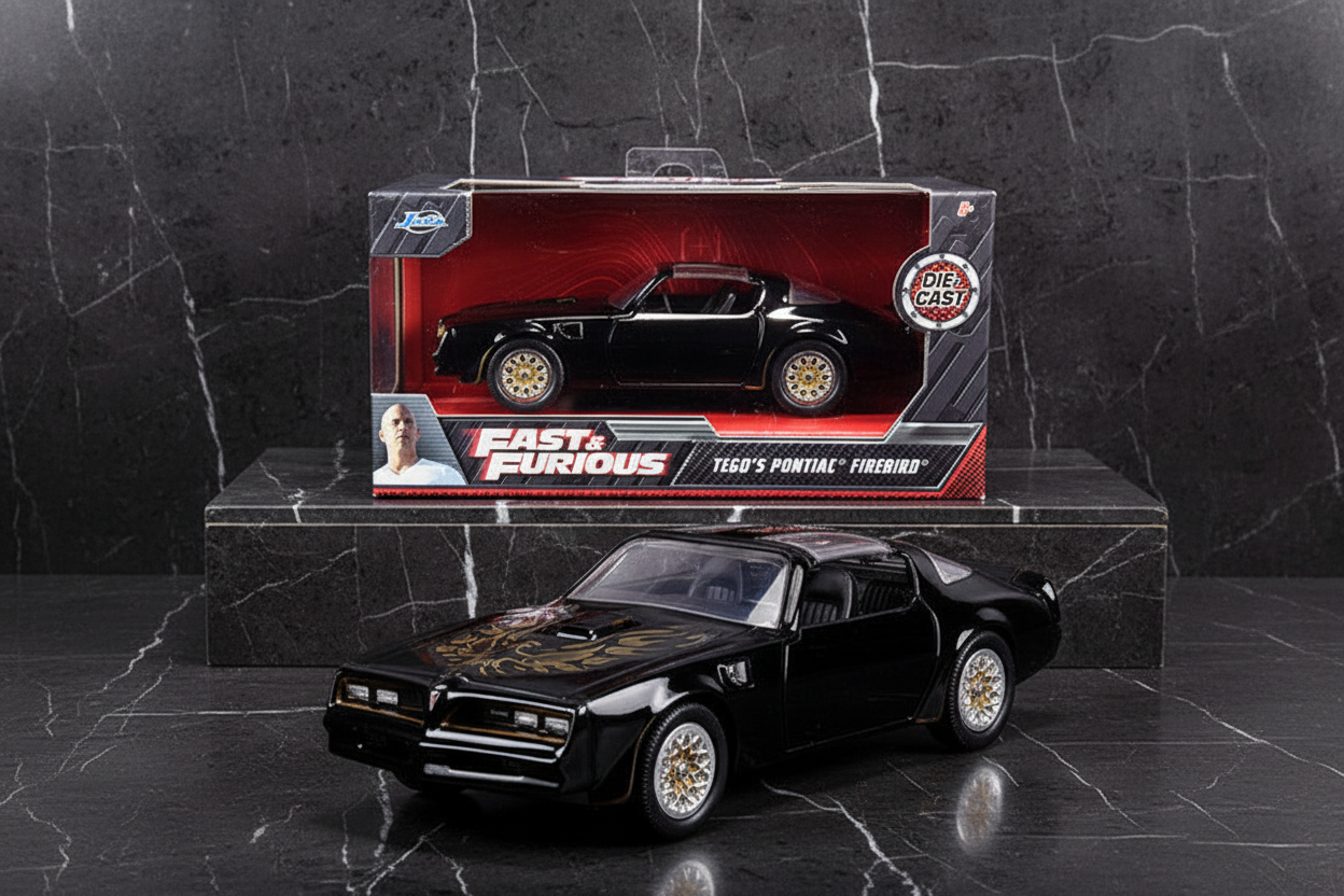 Tego's Pontiac Firebird Black with Gold Stripes and Hood Bird "Fast & Furious" Series 1/32 Diecast Model Car by Jada
