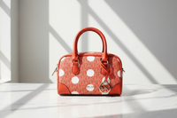 Michael Kors orange tygväska